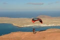 Man during departure with his parapent at Mirador del Rio on Lanzarote island in Spain