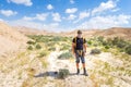 Man in desert wearing keffiyeh. Royalty Free Stock Photo