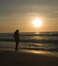 Man on deserted beach Royalty Free Stock Photo