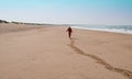 Man on deserted beach