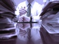 Man at Desk with Files Pointing at Watch Clock Royalty Free Stock Photo