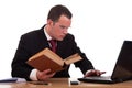 Man on desk reading and studying, Royalty Free Stock Photo