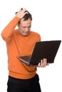 Man despairing with computer Royalty Free Stock Photo