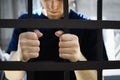 Man detained in jail outdoors. Criminal law
