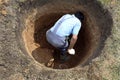 A man digging a new well