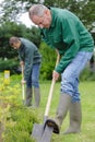 man digs hole Royalty Free Stock Photo