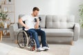 Man Disabled. Sports for Disabled. Male in Wheelchair with Dumbbells in Hands. Man with Dumbbells in Hands. Father Disabled Do Royalty Free Stock Photo