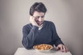 Man disliking food Royalty Free Stock Photo