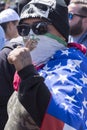 Man displays Chicano power gesture at anti-Trump protest