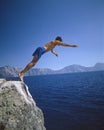 Man diving into Crater Lake