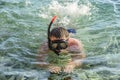 Man in a diving mask in sea water. Royalty Free Stock Photo