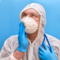 Man doctor medic in a protective suit uniform with goggles and face m Royalty Free Stock Photo