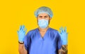 Man doctor uniform yellow background. Type of virus. Coronavirus concept. Expect virus to mutate. Human to human Royalty Free Stock Photo