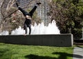 Man does Handstand in front of fountain