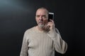 Man does not understand his smartphone Royalty Free Stock Photo