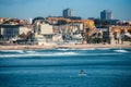 Man does stand up paddle overlooking the coast of Estoril near Lisbon, Portugal Royalty Free Stock Photo