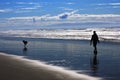 Man and Dog on Beach Royalty Free Stock Photo