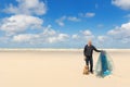 Man with dog at the beach Royalty Free Stock Photo