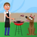 Man and dog have barbecue