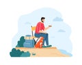 Man with dog hiking and having summer trip. Guy sitting on chair and eating sandwich near backpack on cliff