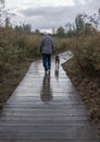 Man and Dog Liard River Hot Springs Provencial Park BC