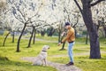 Man with dog in spring public park