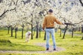 Man with dog in spring public park