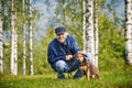 Man Dog trees meadow Royalty Free Stock Photo