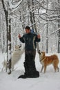 Man and dogs in the snow