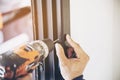 Man doing aluminum frame with glasses and wire screen door and window