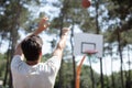 Man doing basketall outdoors