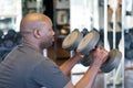 Man doing bench press with a dumbbells