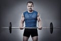 Man doing biceps curl with barbell Royalty Free Stock Photo