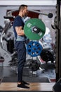 Man doing biceps curl with barbell Royalty Free Stock Photo