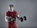 Man doing biceps curl with dumbbells Royalty Free Stock Photo