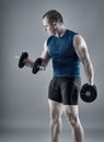 Man doing biceps curl with dumbbells Royalty Free Stock Photo