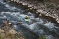 Man doing canoe Kayak on a river with strong stream Intensive sport