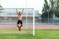 Man Doing Chin-ups outdoor.