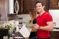 Man doing dishes with his girl