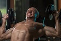 Man Doing Dumbbell Incline Bench Press Workout