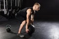 Man Doing Exercise With Medicine Ball