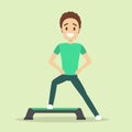 Man doing exercise on step. Cardio workout and aerobics