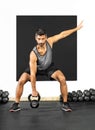 Man doing exercises with a kettlebell weight