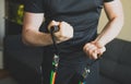 Man doing exercises with resistance bands.