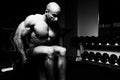Man Doing Heavy Weight Exercise For Trapezius Royalty Free Stock Photo