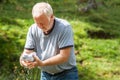 Man doing his own laundry in nature Royalty Free Stock Photo