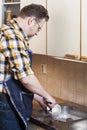 Man doing household chores Royalty Free Stock Photo