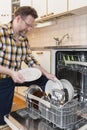 Man doing household chores Royalty Free Stock Photo