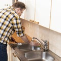 Man doing household chores Royalty Free Stock Photo