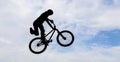 Man doing an jump with a bmx bike. Royalty Free Stock Photo